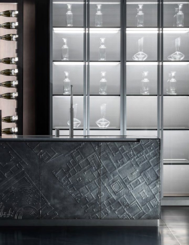 Bespoke joinery with a textured stone front, produced in the Kasa8 workshops