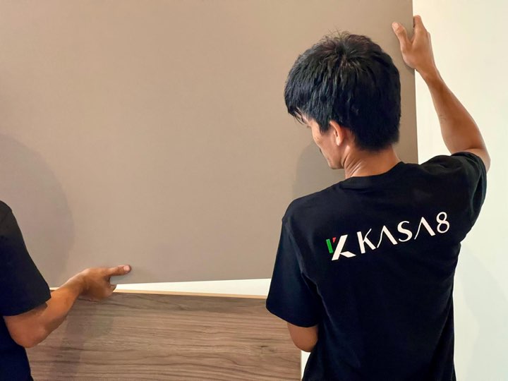 A member of the Kasa8 team fitting a panel on site